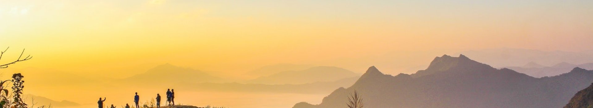 photo of people standing on top of mountain near grasses 733162.jpg